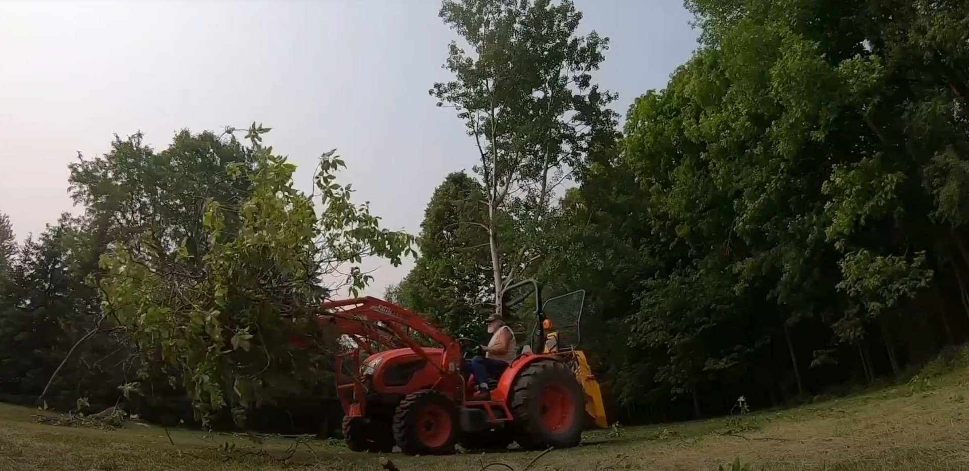 Land clearing and lot preparation services Heavy machinery clearing large areas for land development and lot preparation